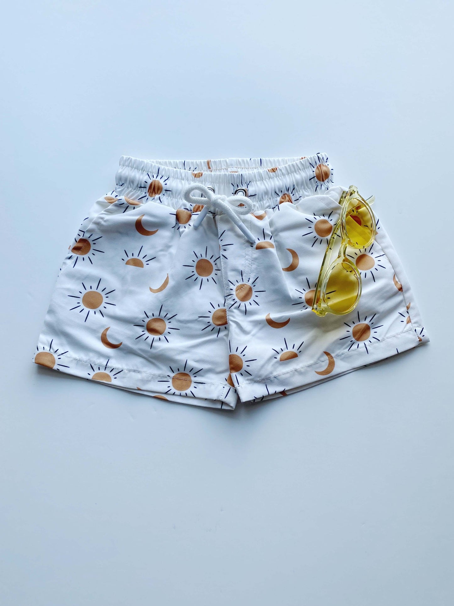 bird and bean boho sun and moon swim trunks