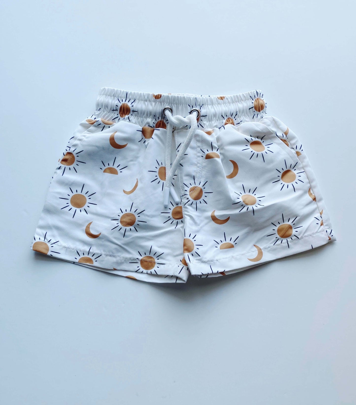 bird and bean boho sun and moon swim trunks